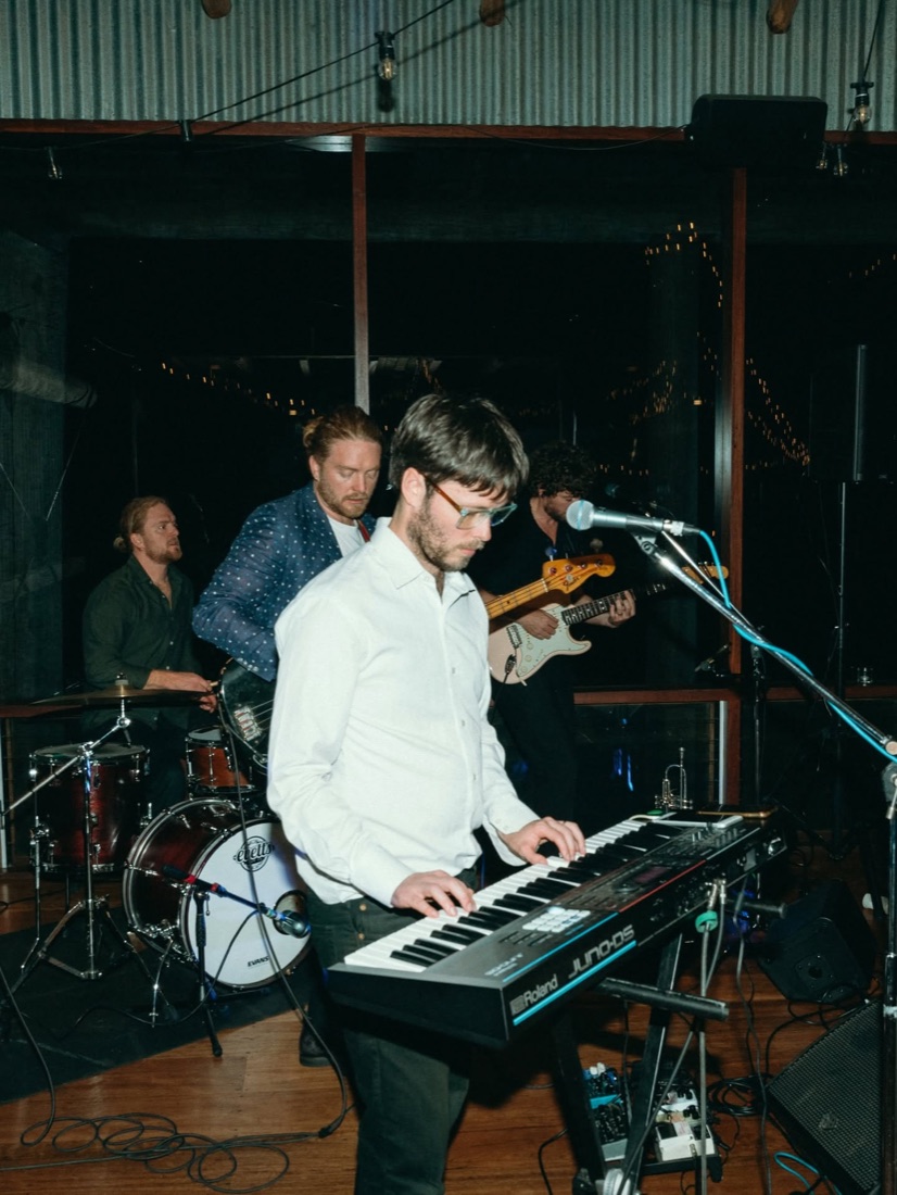 Hot Minute performing live with keyboard, guitars and drums
